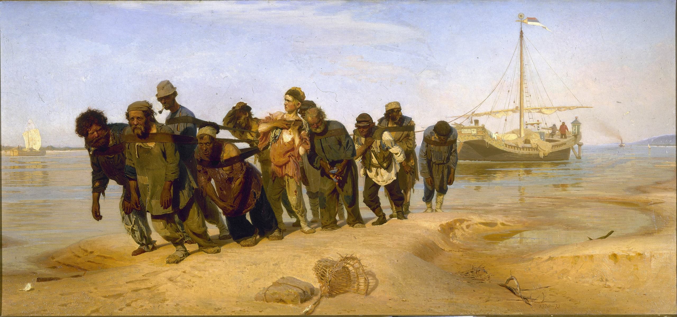 A wide, low painting of eleven men in harness hauling along a riverbank under a heavy sky; the central younger figure pulls upright against his straps while the others lean forward in exhaustion.