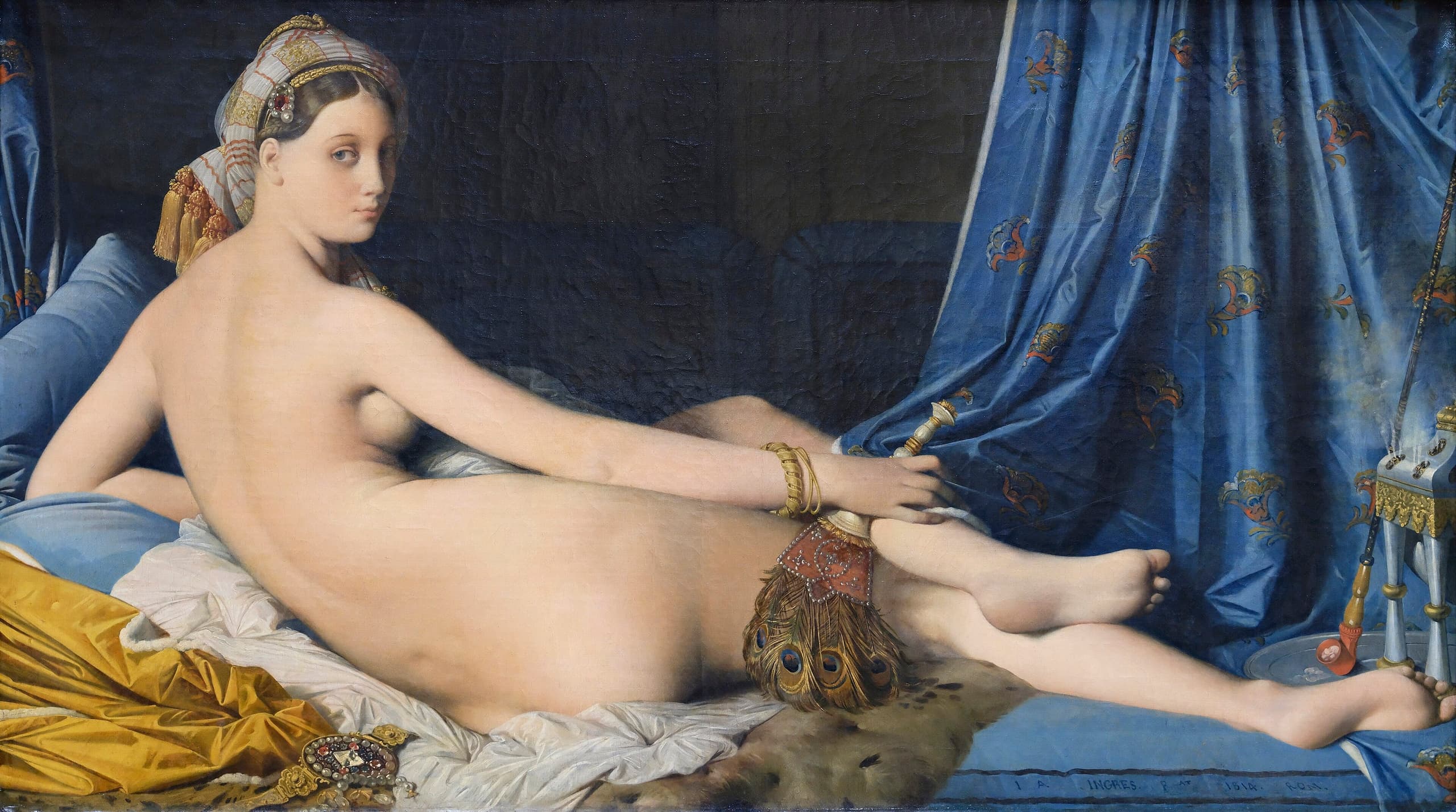 A nude woman reclines across a wide canvas, her back toward the viewer, head turned to look out. Smooth flesh, drapery and a low, dim interior; the body appears markedly elongated.