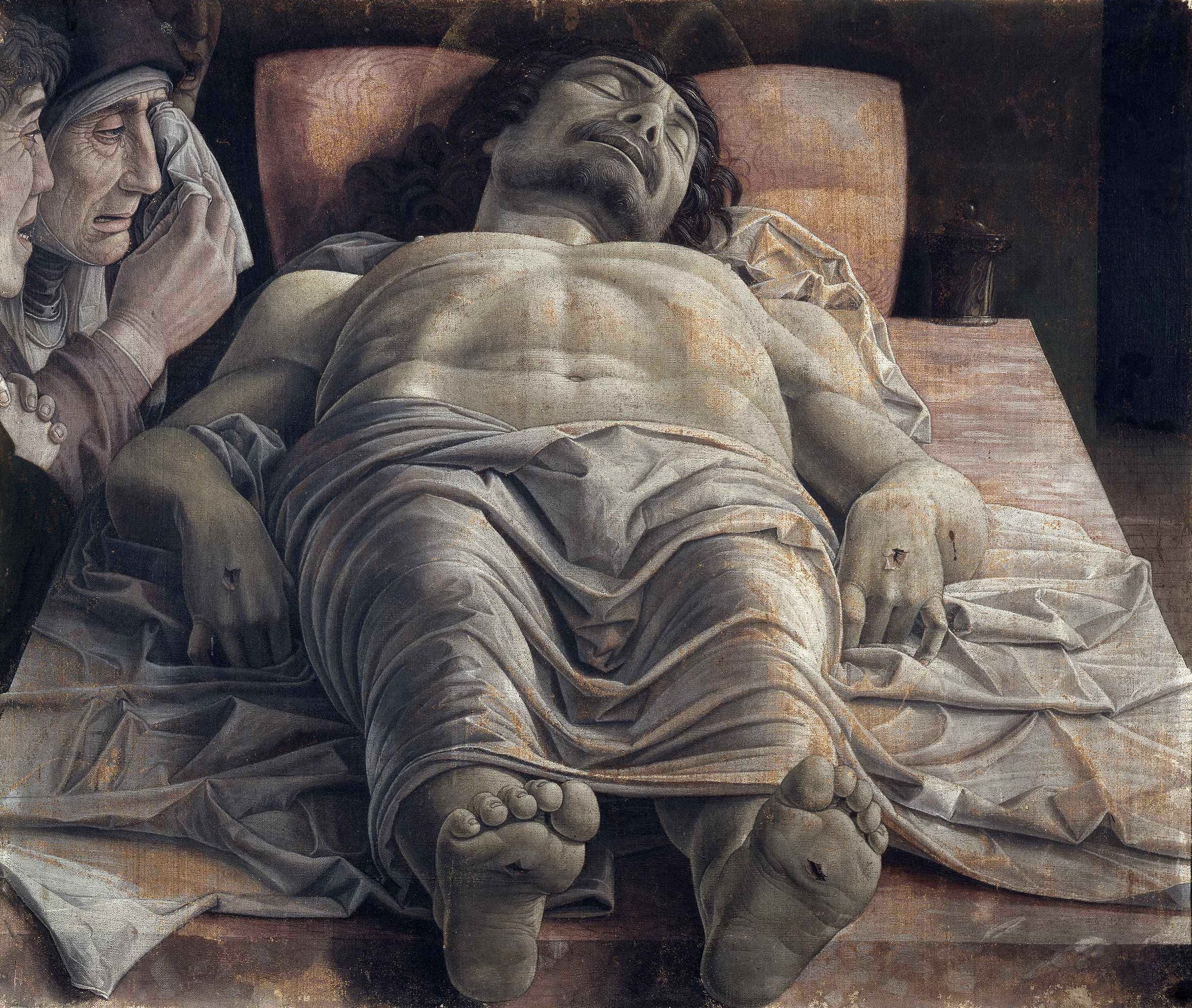 A dead man lies on a veined marble slab, feet foremost and head receding in sharp foreshortening. At upper left three weeping figures crowd the edge; wounds mark the hands, feet and side.