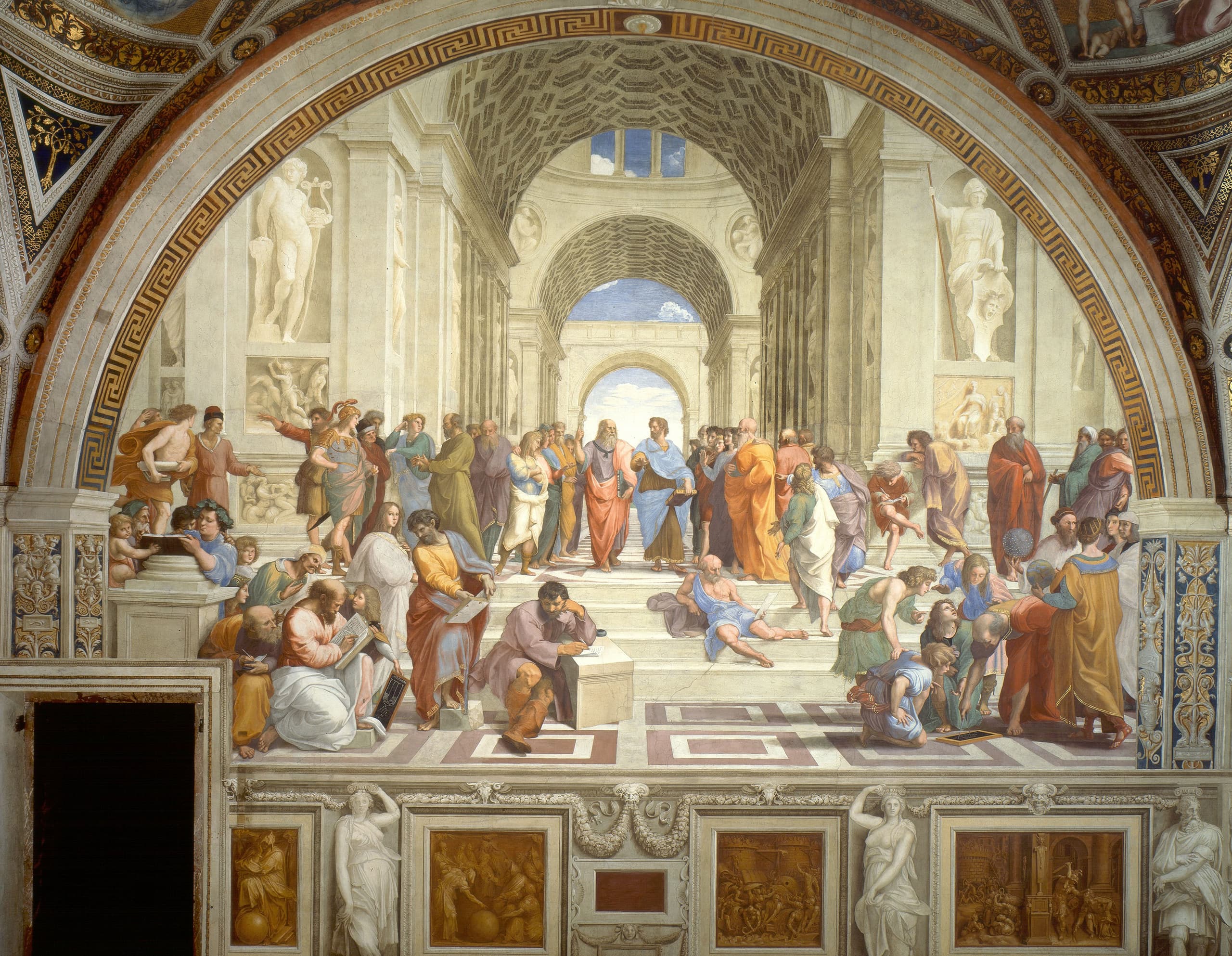 A vast classical hall filled with figures in robes, grouped in conversation and study. Two men walk at the centre beneath a receding arch. Steps, sculptures, books, and geometric instruments populate the space.