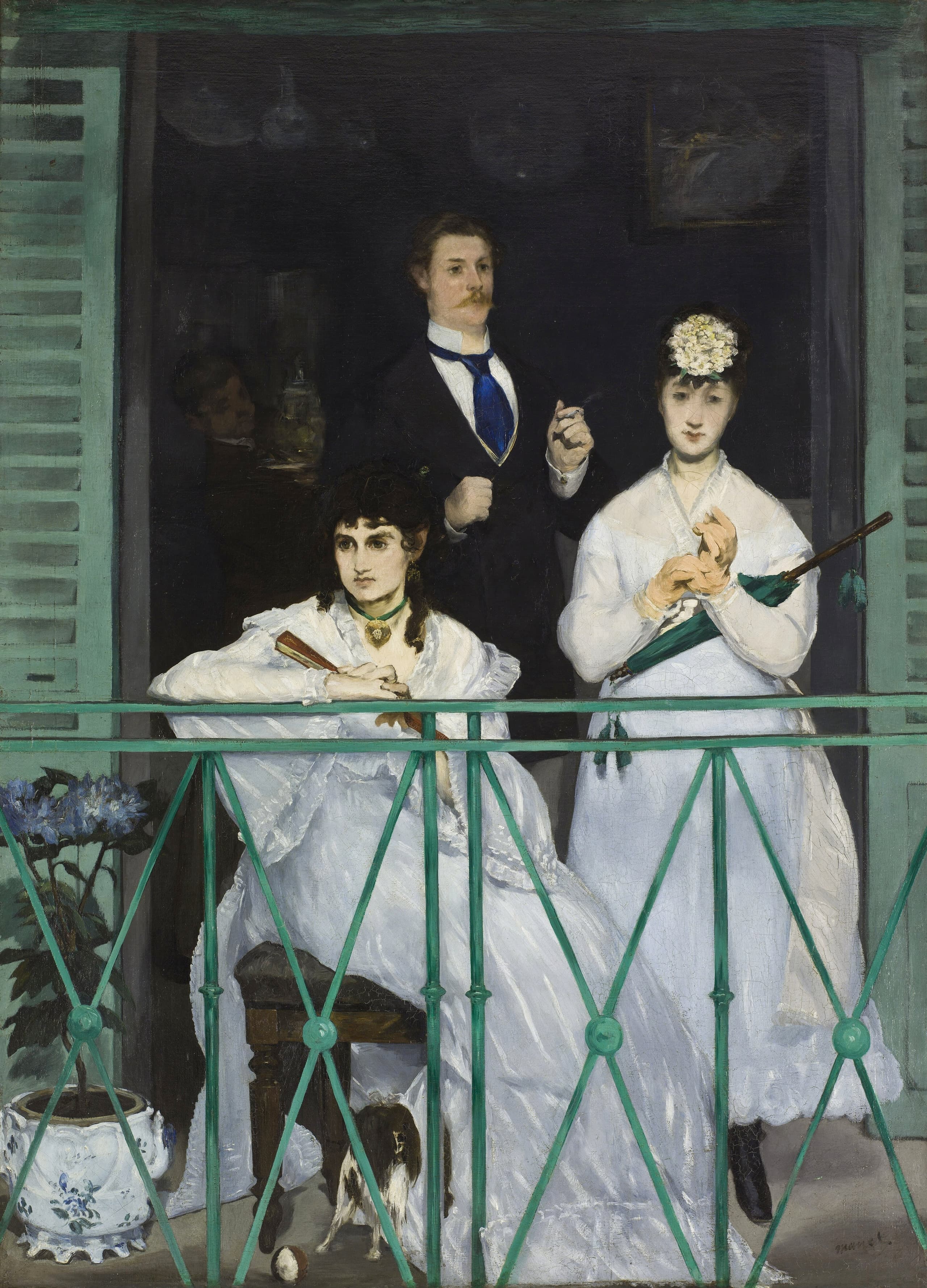 Three figures on a balcony, one seated and two standing, with a fourth person only partly visible in the dim interior behind them.
