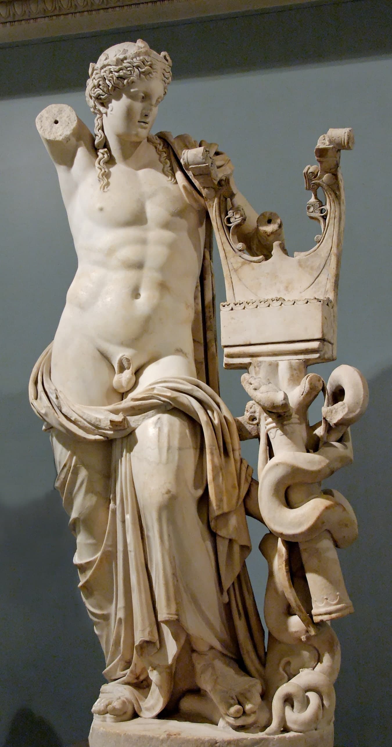 A large standing marble sculpture of the god Apollo, recorded at 229 centimetres (7 ft 6 in) in height, of second-century date, displayed as a museum object.