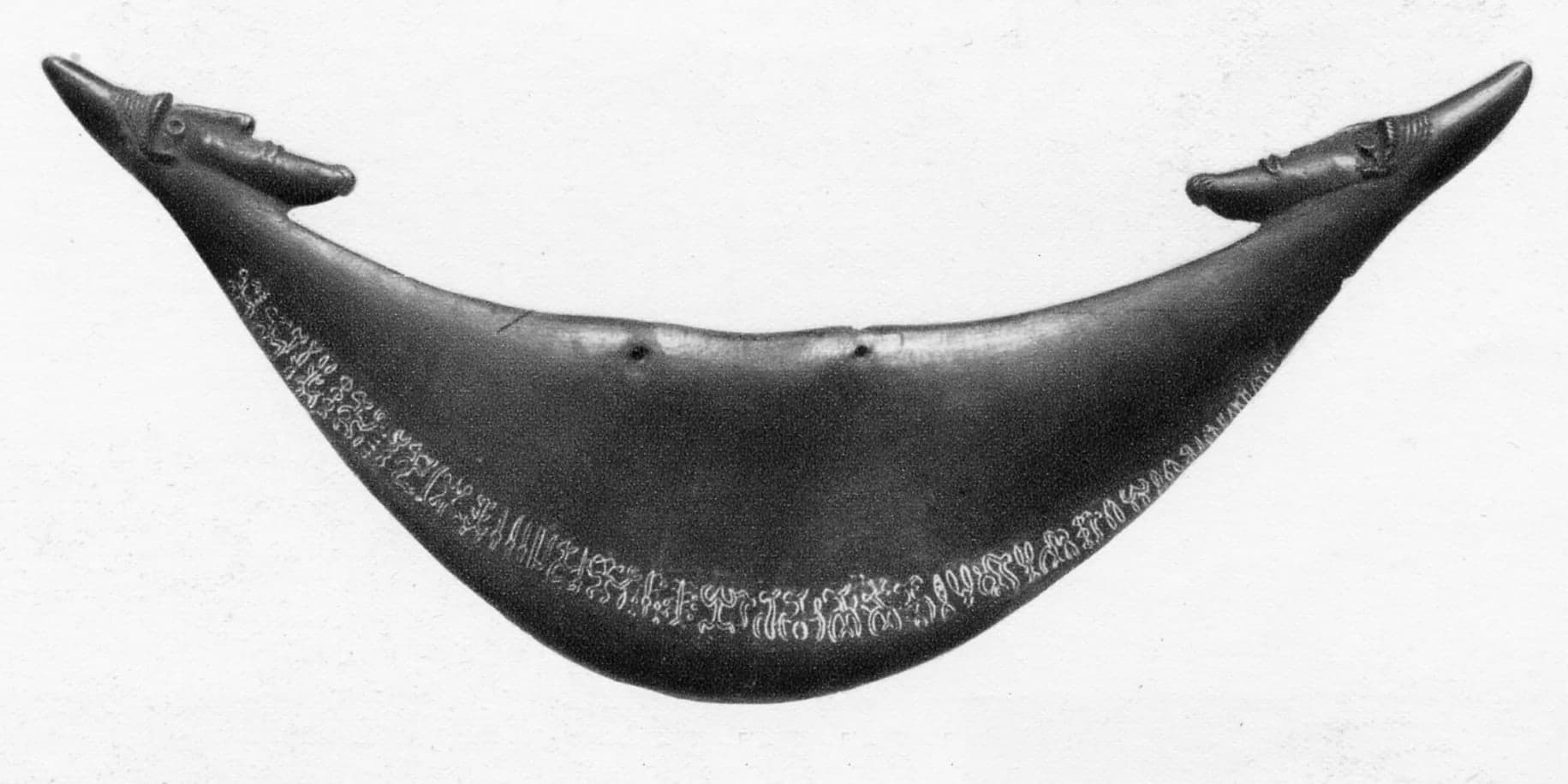 A wooden tablet from the rongorongo corpus, the smaller of two inscribed reimiro held in the British Museum.