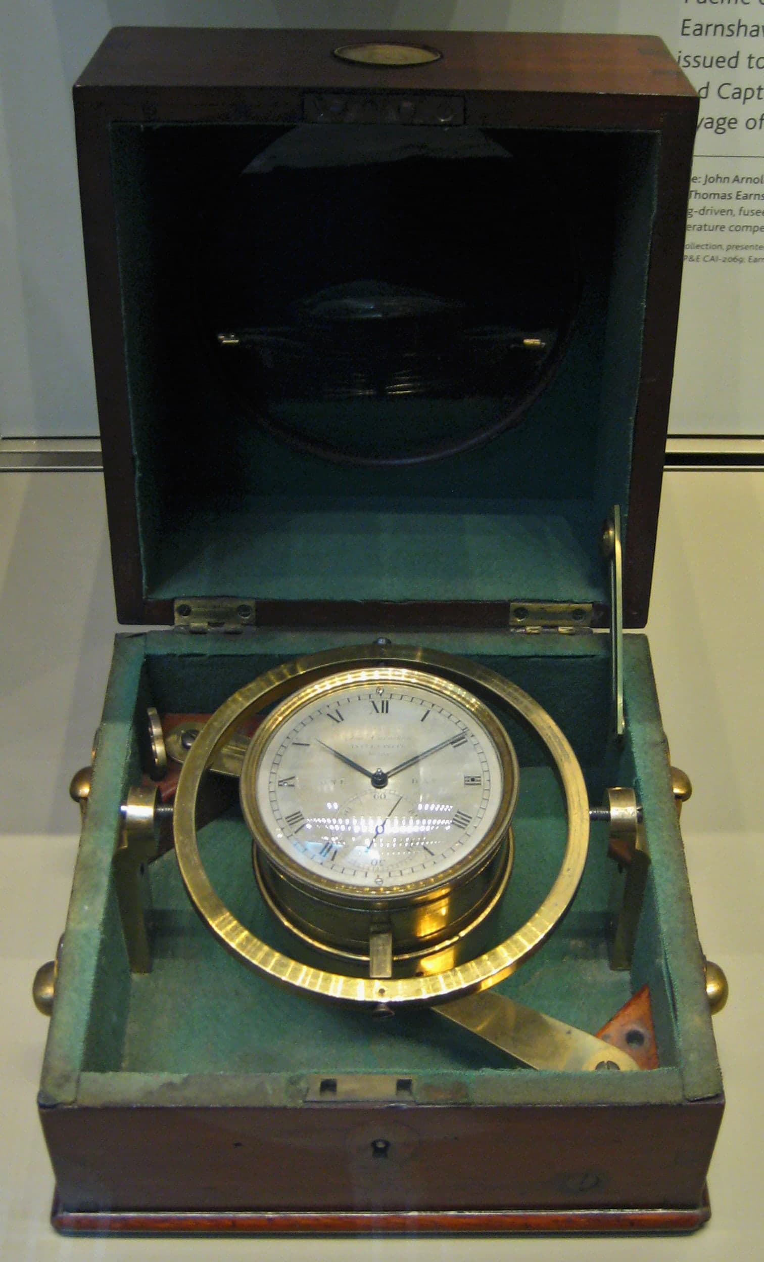 A historic marine chronometer associated with HMS Beagle, made by Thomas Earnshaw and now in the British Museum, shown as a precision timekeeping instrument from early nineteenth-century naval survey work.