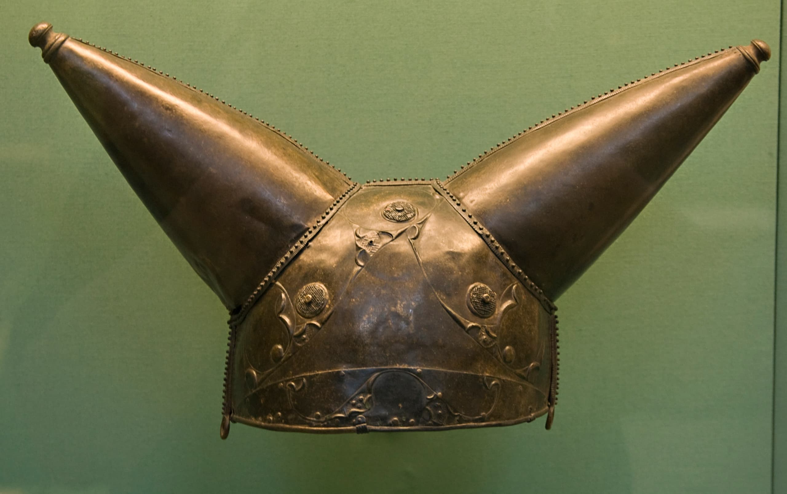 A bronze helmet, classified as Celtic; the available record provides no reliable visual description beyond its material and object type.