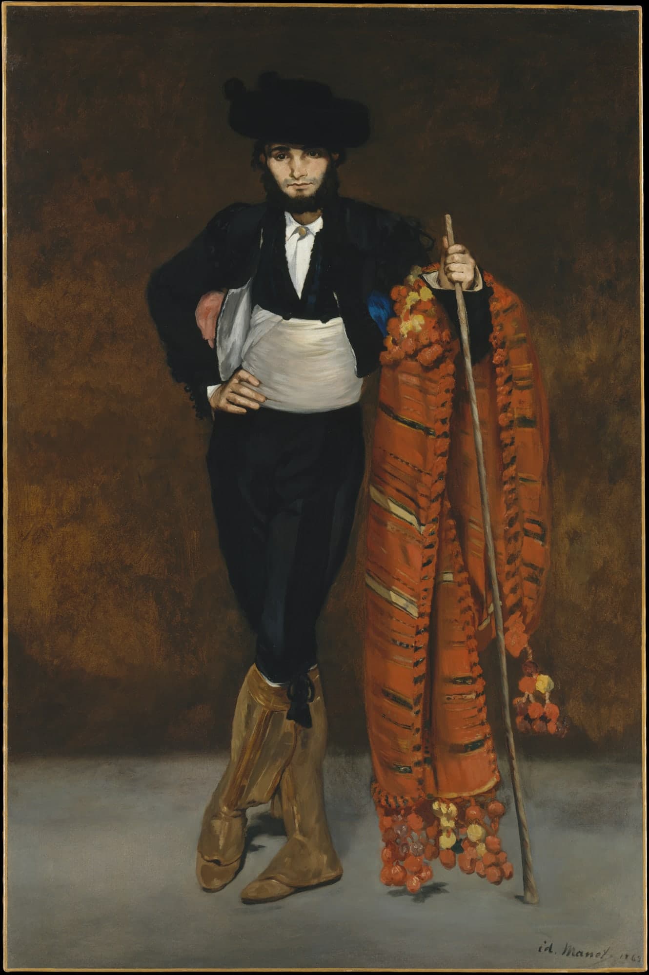 A tall oil painting of a young man standing full-length in dark Spanish-style dress against a subdued ground, on a canvas nearly two metres high.