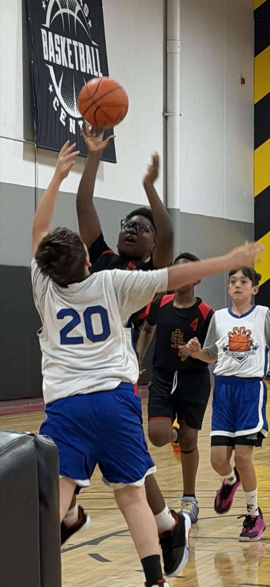 Merryhill basketball game action