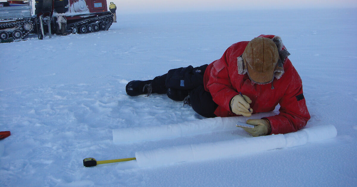 Scientists analyzing gas samples from ice cores in laboratory